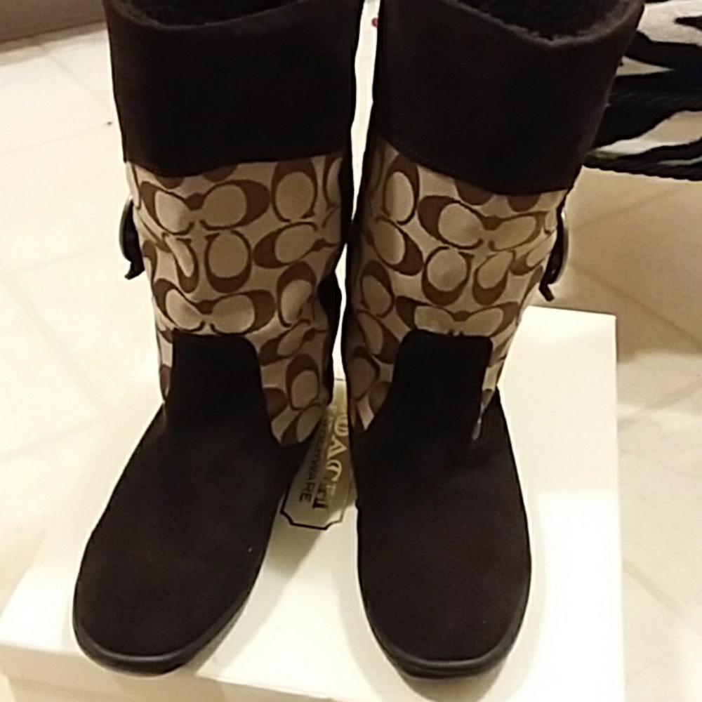 Coach Meyer suede boots.